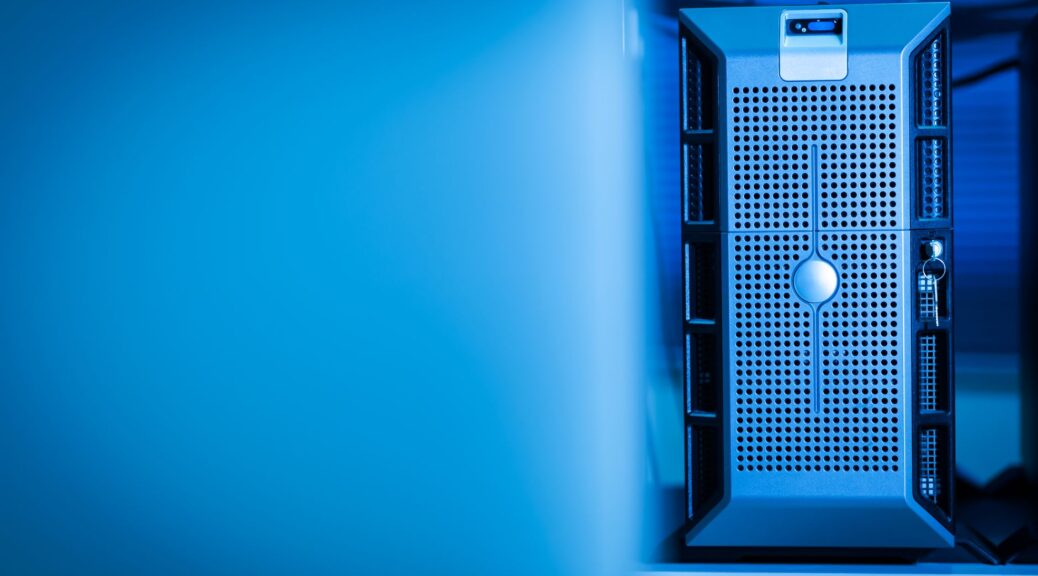 High density AI data center server racks illuminated by neon lights with liquid cooling pipes